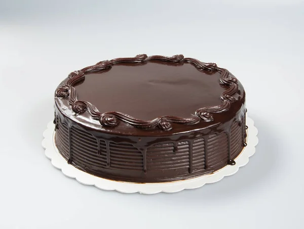 Pastel o pastel de chocolate sobre un fondo . —  Fotos de Stock