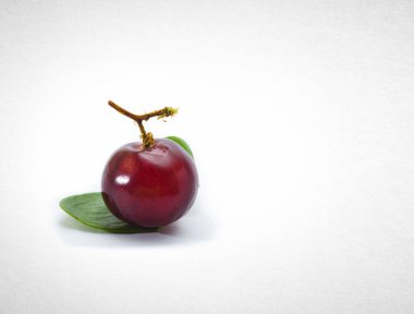 Üzüm veya bir arka plan üzerinde kırmızı üzüm.