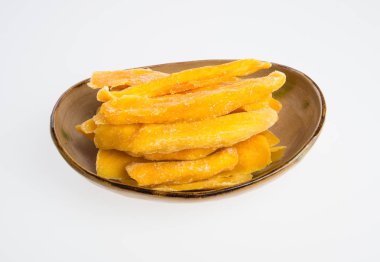 Bir arka plan üzerinde kurutulmuş Mango veya kurutulmuş Mango dilimleri.