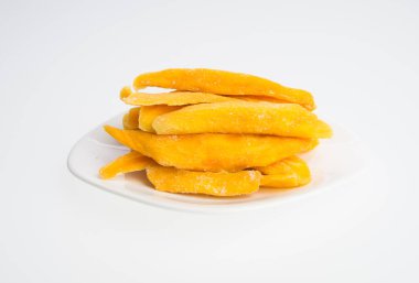 Bir arka plan üzerinde kurutulmuş Mango veya kurutulmuş Mango dilimleri.