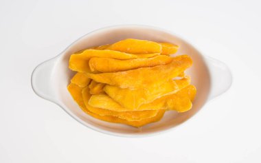 Bir arka plan üzerinde kurutulmuş Mango veya kurutulmuş Mango dilimleri.