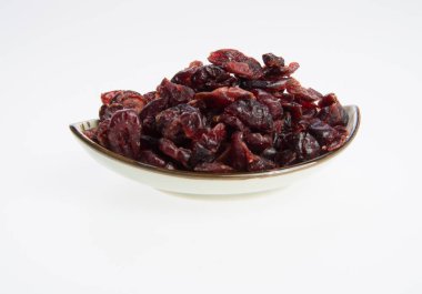 kurutulmuş kızılcık veya bir arka plan üzerinde kurutulmuş meyve.