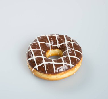 çörek veya bir arka plan üzerinde çikolatalı çörek.