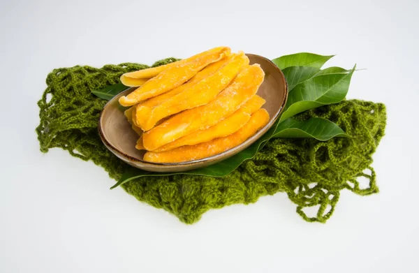 Dried Mango or Dried Mango slices on a background. — Stock Photo, Image