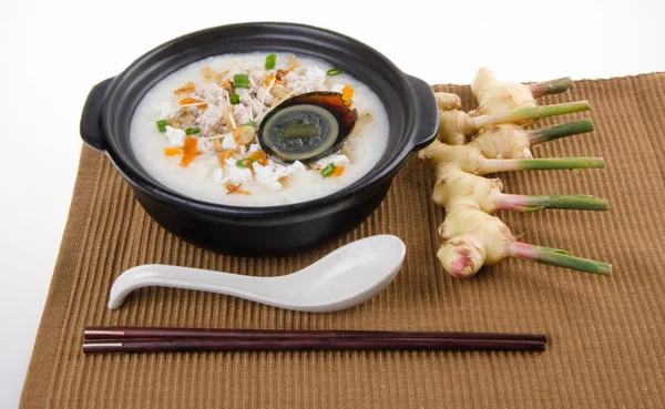 Traditional chinese century egg & pork porridge rice gruel serve — Stock Photo, Image