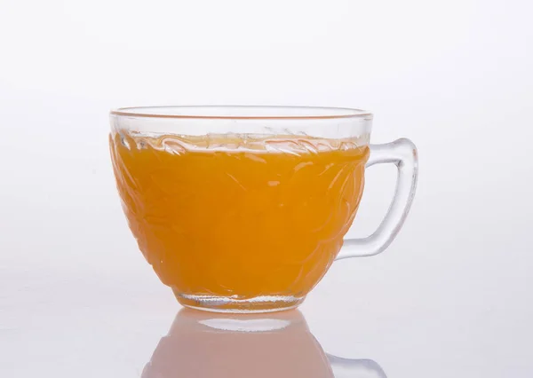 Jus d'orange op een achtergrond — Stockfoto