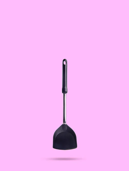 Keukengerei of spade van koekenpan op achtergrond. — Stockfoto