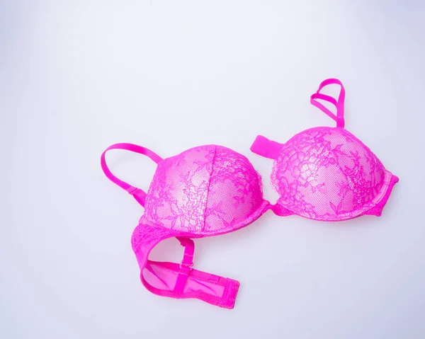 Bra atau bra warna pink pada latar belakang putih . — Stok Foto