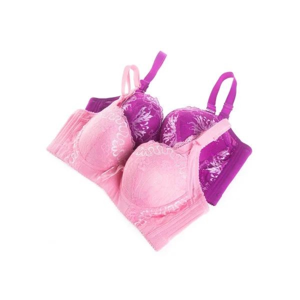 Reggiseno o reggiseni di colore diverso su sfondo bianco . — Foto Stock