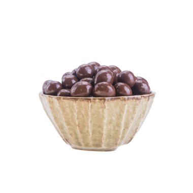 Arka planda çikolata topu ya da çikolata topları.