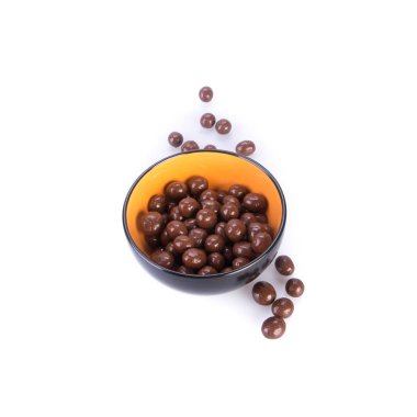 Arka planda çikolata topu ya da çikolata topları.