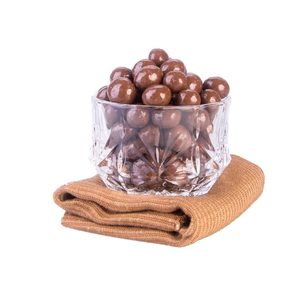 Palla di cioccolato o palline di cioccolato in piatto su sfondo nuovo . — Foto Stock
