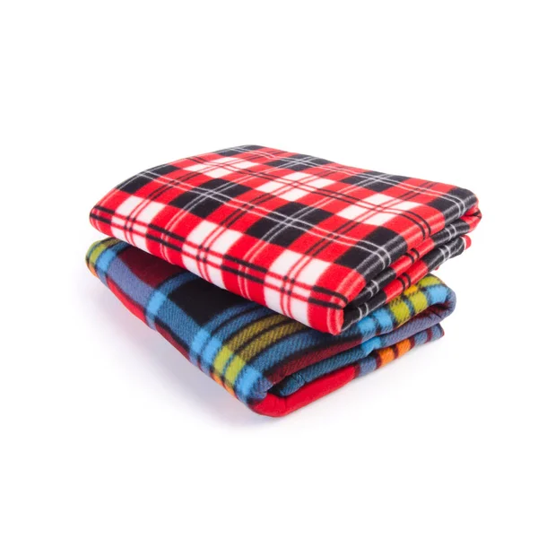 Blanket or folded blanket on a background new. — Stock Photo, Image