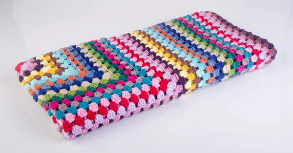 Blanket or crochet blanket on a background new. — Stock Photo, Image
