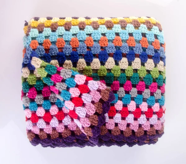 blanket or crochet blanket on a background new.