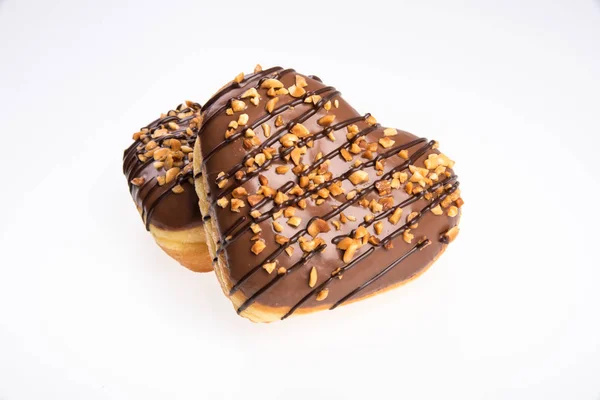 Donut eller hjärta formad Donut på en bakgrund ny. — Stockfoto