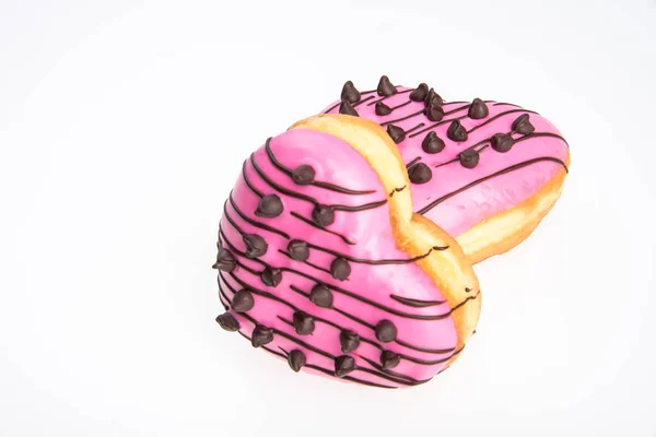 Donut oder herzförmiger Donut auf neuem Hintergrund. — Stockfoto