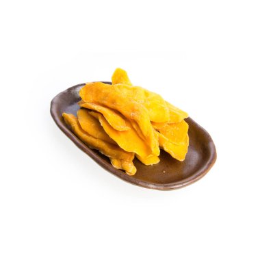 Kurutulmuş mango veya kurutulmuş mango dilimleri yeni bir arka planda.