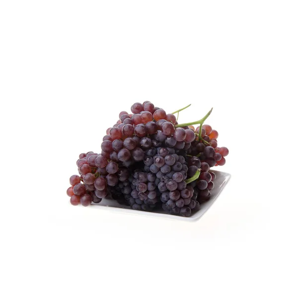 Uvas o uvas frescas sobre un fondo nuevo . — Foto de Stock