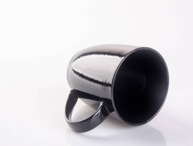 Arka planda seramik kupa ya da kupa rengi.