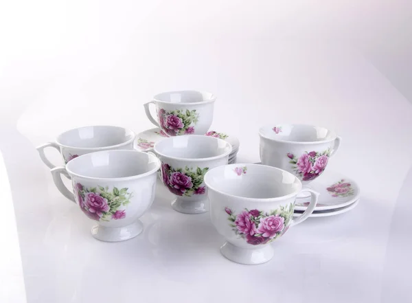 Tazza o dipinto a mano tazza di ceramica fiore impostato sullo sfondo nuovo — Foto Stock