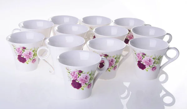 Šálek nebo ručně malované květiny keramický hrnek set na pozadí nové — Stock fotografie