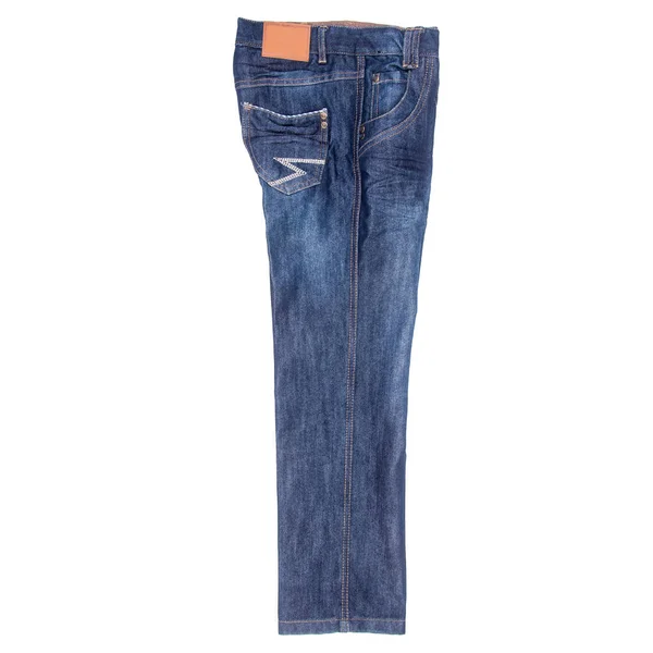 Džíny nebo modré džíny s konceptem na bílém pozadí nové. — Stock fotografie