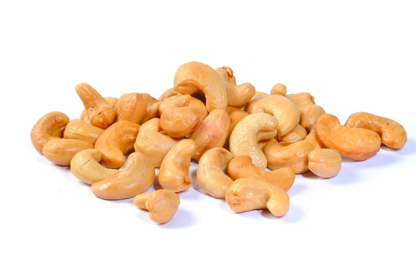 Nüsse oder Cashewnüsse im Hintergrund neu. — Stockfoto