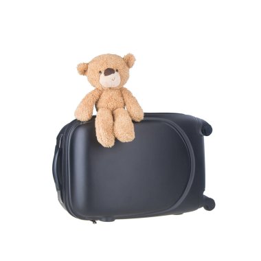 Oyuncak ayı yeni bir konseptle bagajda oturuyor..