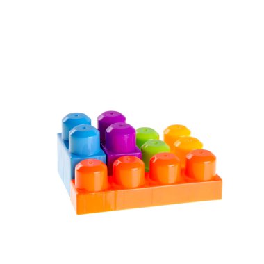 Yeni arkaplanda oyuncak ya da plastik yapı taşları.
