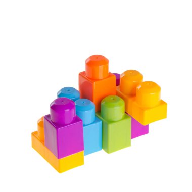 Yeni arkaplanda oyuncak ya da plastik yapı taşları.