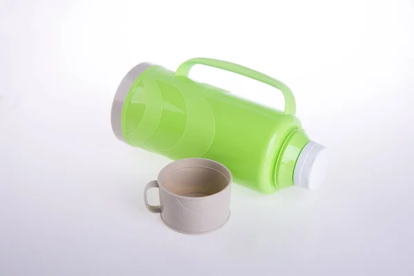 Thermo or Plastic Thermos flask on background new. — Stock Photo, Image