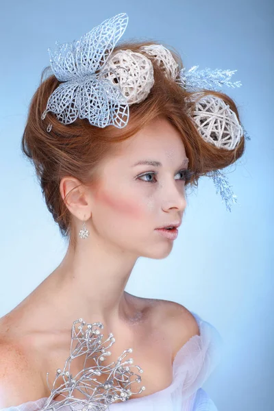 Girl with new-year decorations in hair — Stock Photo, Image