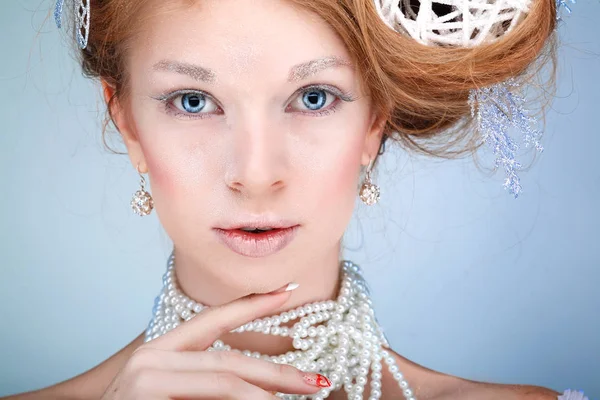 Girl with new-year decorations in hair — Stock Photo, Image