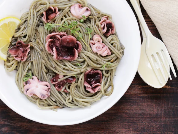 delicacy black pasta with black cuttlefish sauce