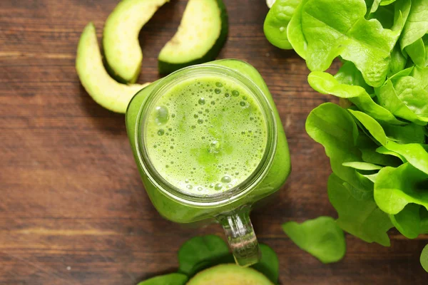 Fresh natural organic green smoothie with avocado — Stock Photo, Image