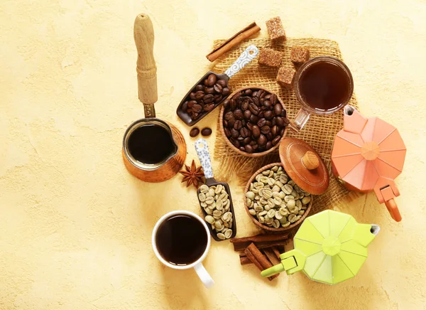 Still life of coffee - green and brown beans and spices, cinnamon and anise — Stock Photo, Image