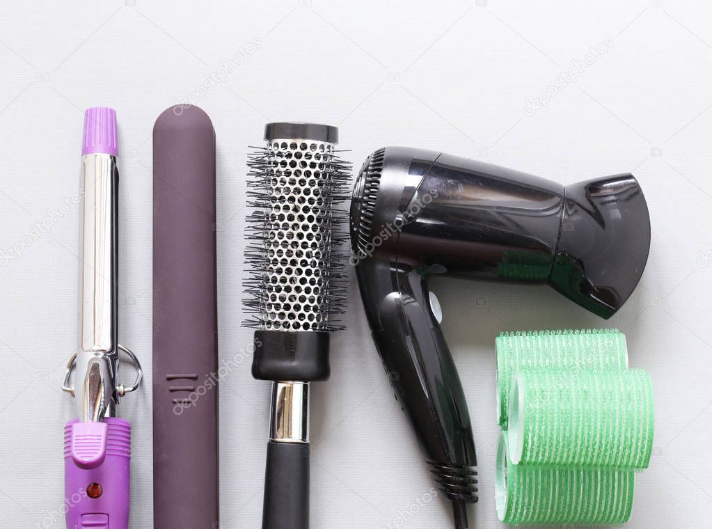 Set the tools hairdressers - hair dryer, curling iron, comb