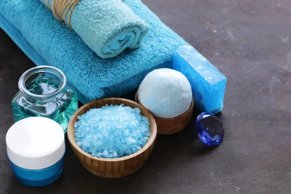 Spa concept turquoise - soap, salt, cream, towel — Stock Photo, Image