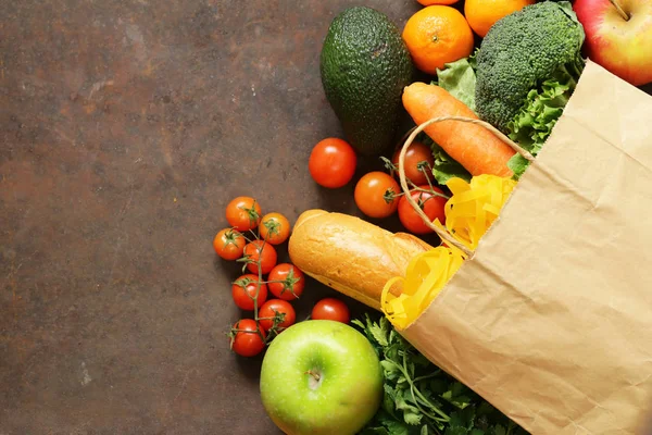 Grocery food shopping bag - vegetables, fruits, bread and pasta