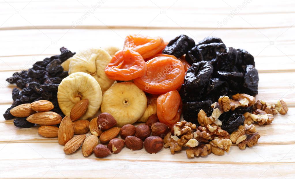 Assorted various dried fruits (dried apricots, prunes, figs)