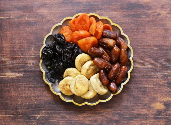 Assorted various dried fruits (dried apricots, prunes, figs) — Stock Photo, Image