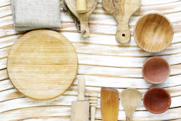 Empty wooden utensils on the table, rustic style — Stock Photo, Image