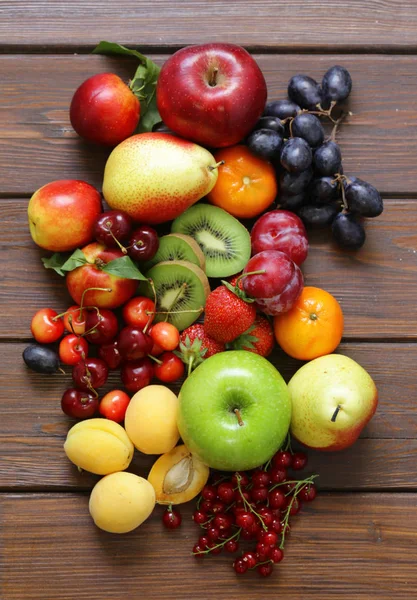 Different fruits and berries, healthy food — Stock Photo, Image