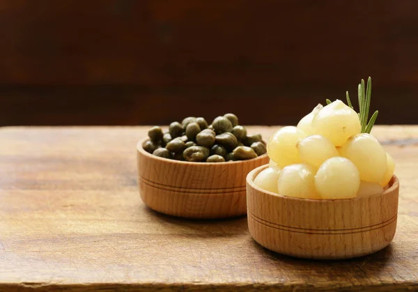 Marinated pearl onions pickled and capers — Stock Photo, Image