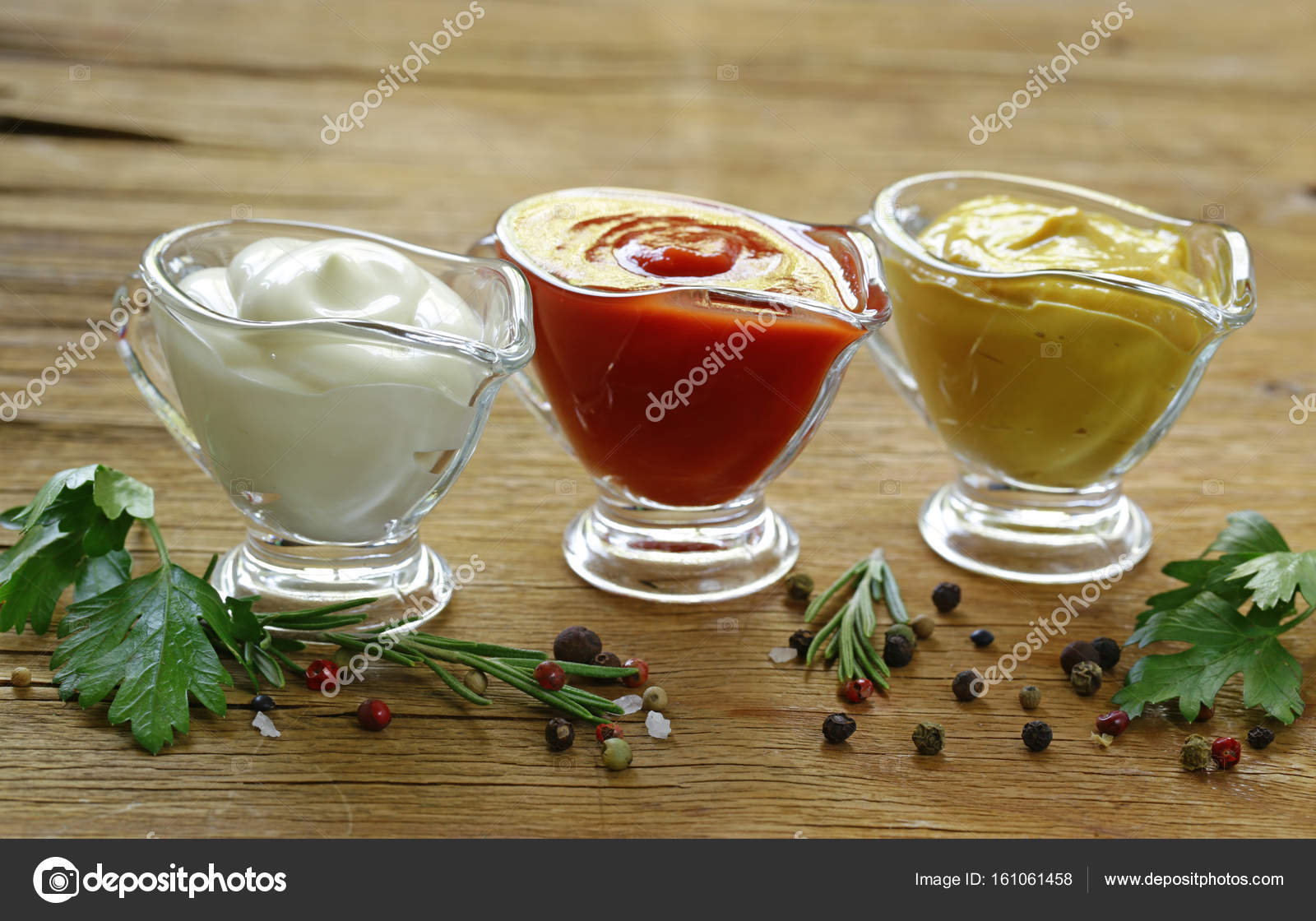 Different types of sauces in glass gravies Stock Photo by ©Dream79