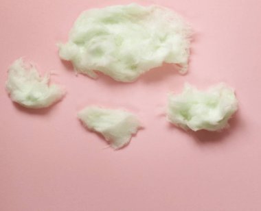 Tatlı pembe pamuk şeker renkli bir arka plan üzerinde