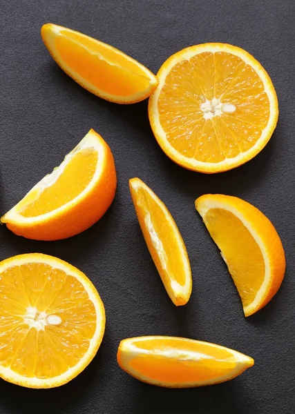 Ripe organic orange sliced into slices — Stock Photo, Image