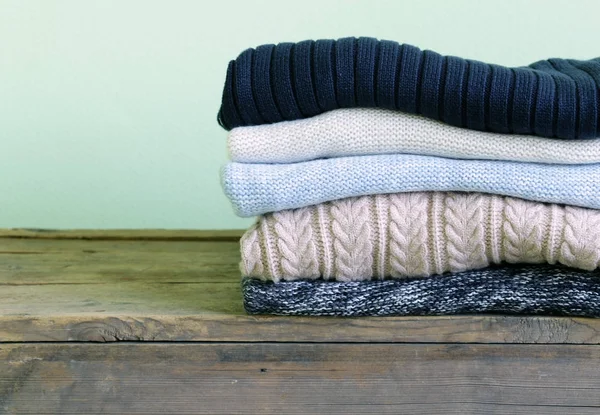 Warm Knitted Sweaters Wooden Shelf — Stock Photo, Image