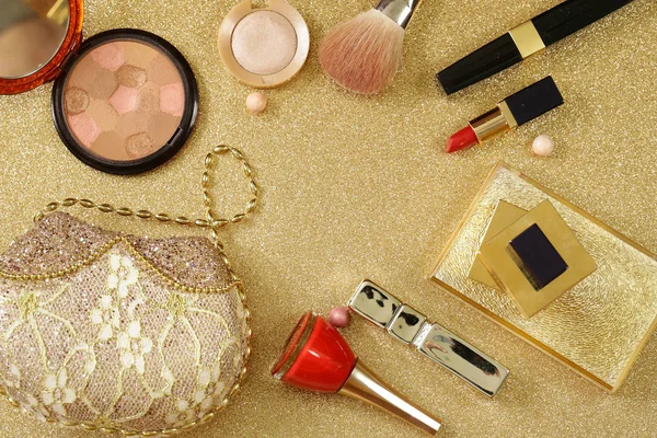 set cosmetics for makeup - brushes and eye shadows, lipstick and nail polish